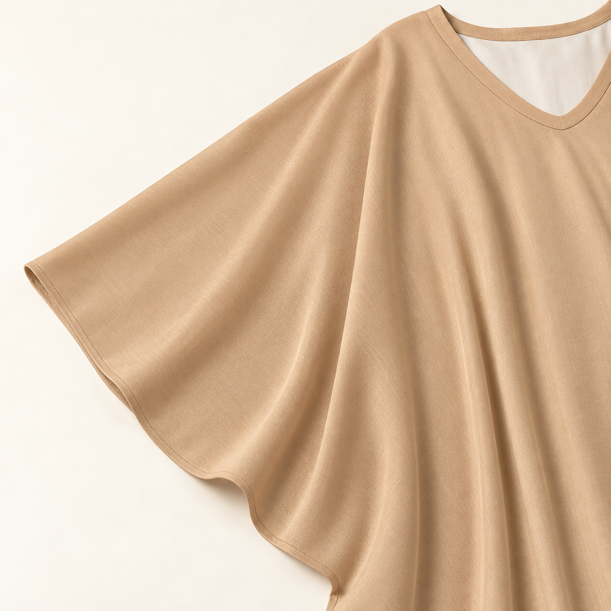 Sand Kaftan · detail · AI-assisted editorial image